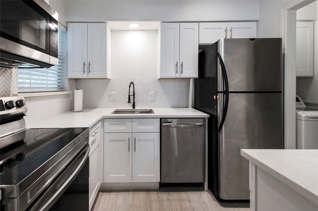 Kitchen open to dining and living room | Image 4