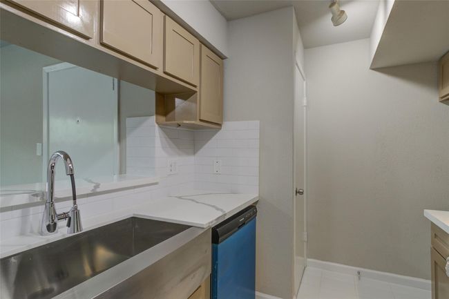 Another view of the kitchen. | Image 10