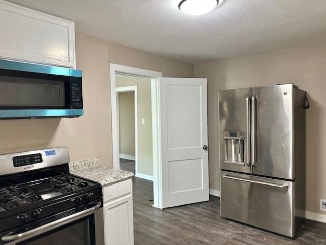 Kitchen with Refrigerator | Image 4