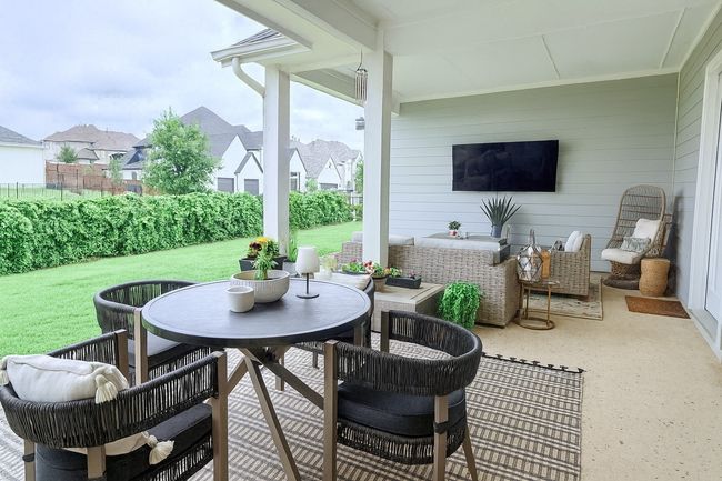 View of patio featuring an outdoor hangout area and outdoor dining space | Image 5