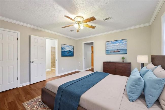 Large Master Bed with walk in closet - virtually staged | Image 19