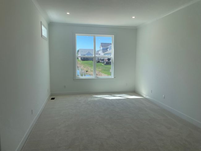 Luxurious primary bedroom suite | Image 11