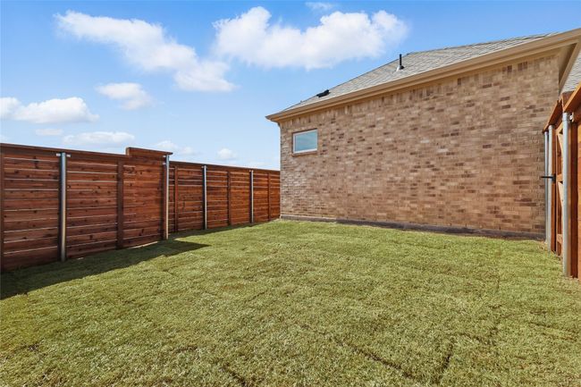 View of yard with a fenced backyard | Image 30