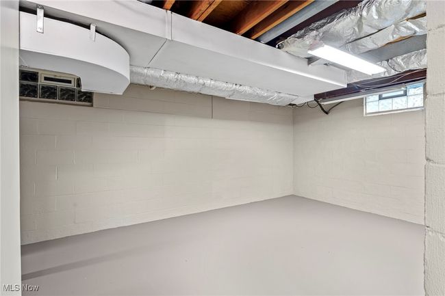 Below grade area with concrete block wall | Image 37