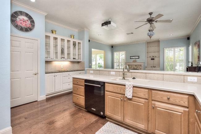 Kitchen is open to living area so you don't have to miss out on the fun. | Image 14
