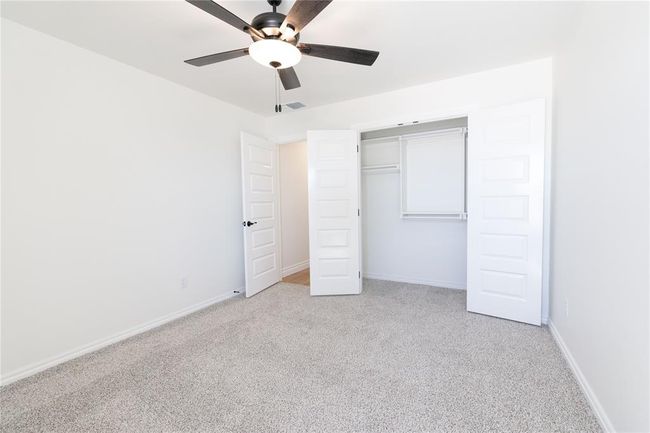 Garage featuring a garage door opener | Image 20