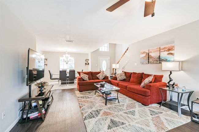 Another view of the living and dining areas. | Image 6