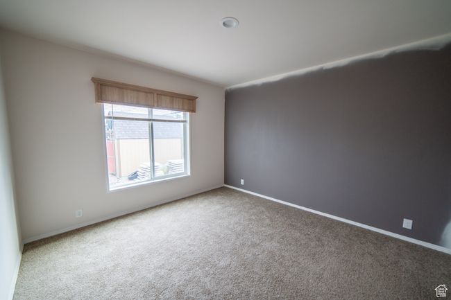 Unfurnished room with carpet floors and baseboards | Image 65