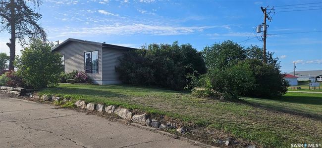 View of side of property featuring a lawn | Image 7
