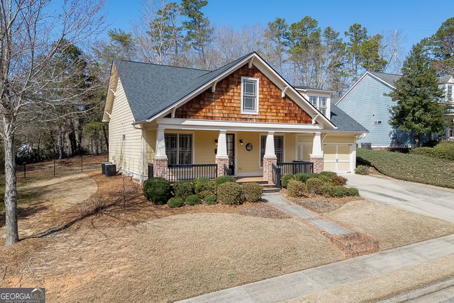 7056 Dove Point Ln, House other with 4 bedrooms, 3 bathrooms and null parking in Hoschton GA | Image 4