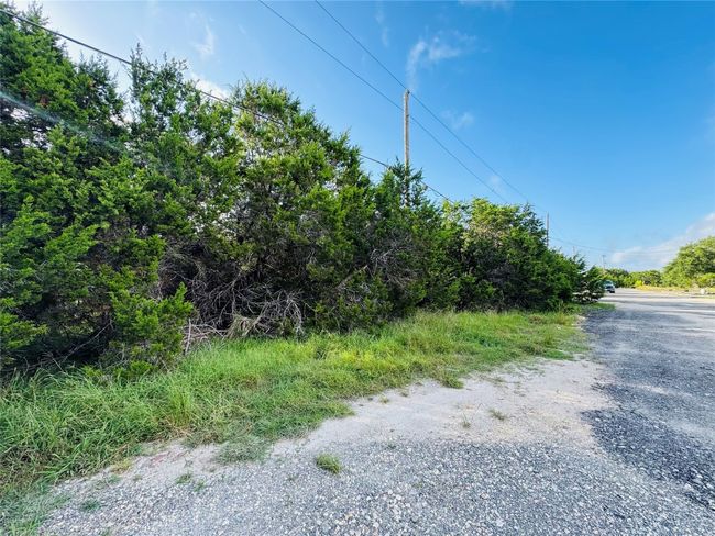 View of dirt / gravel road | Image 5