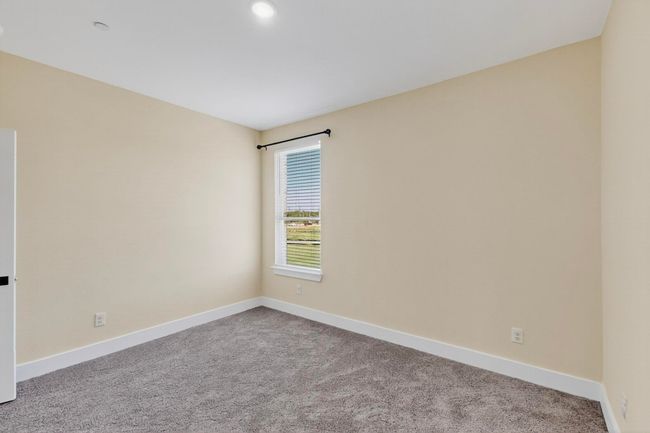 Carpeted empty room featuring baseboards and recessed lighting | Image 20