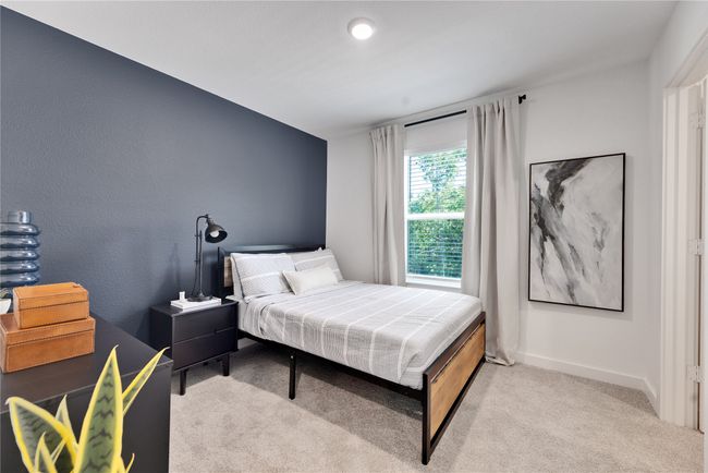 Bedroom with light carpet and baseboards | Image 24