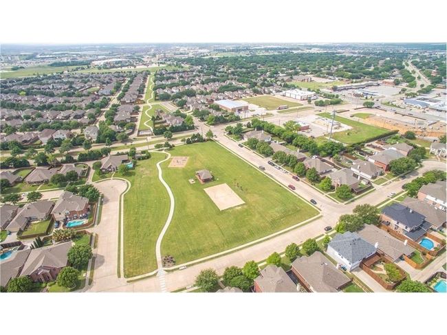 Aerial view of property's location with nearby suburban area | Image 24