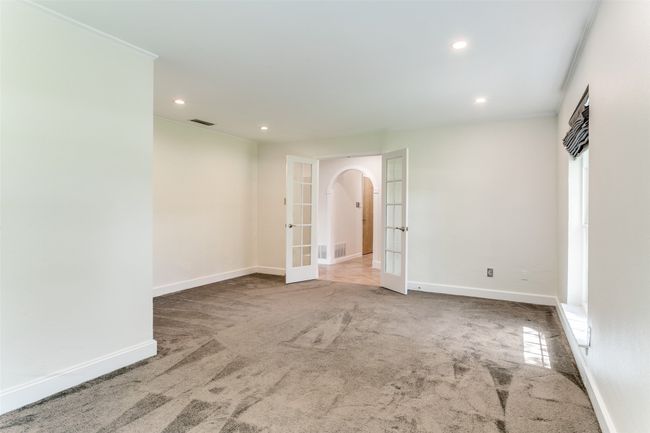 Living room to entry. | Image 16