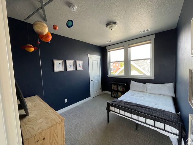 Carpeted bedroom | Image 55