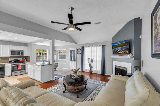 Kitchen is open to the living room. | Image 16