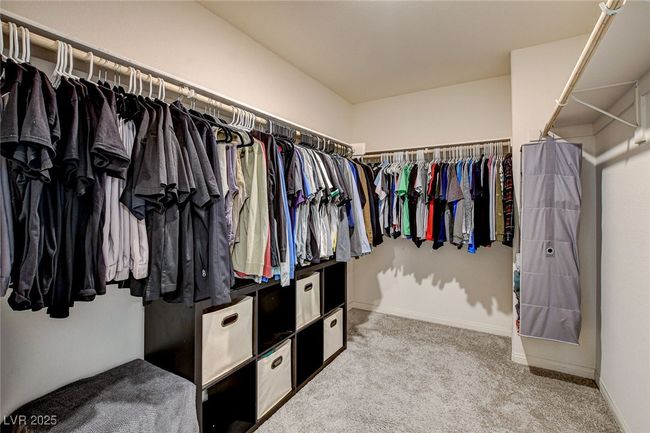 Spacious closet with carpet | Image 27