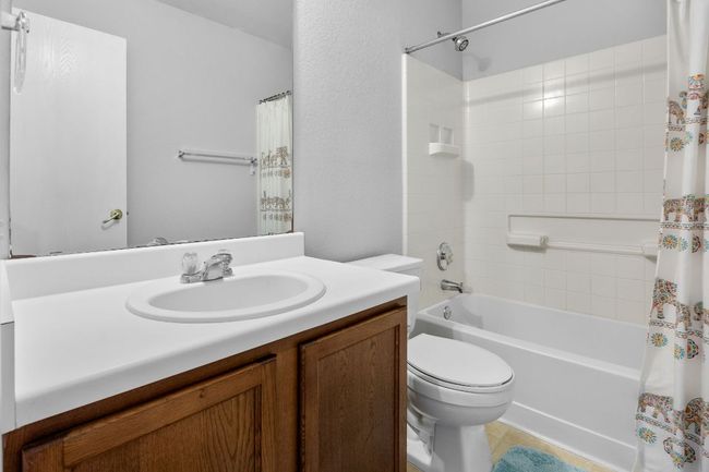 Third bathroom features shower/tub combo. | Image 22