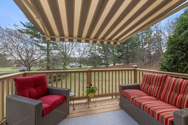 Walk out to lovely deck with retractable awning | Image 11