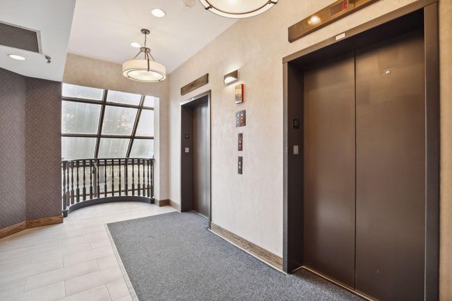 Bedroom has a closet with washer and dryer hookups for added convenience. | Image 7