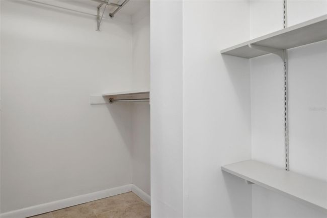 Primary Bedroom Walk-in Closet | Image 23