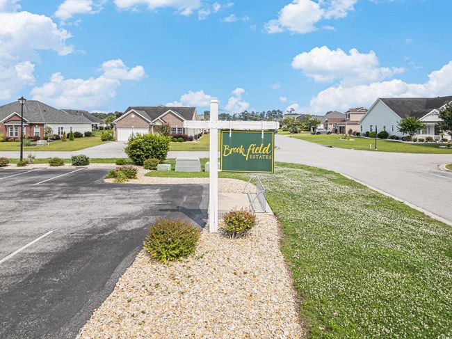 Exterior view of a residential view and parking | Image 33