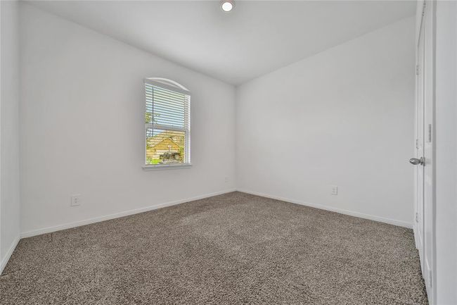 Bedroom 2 at the front of the home. | Image 32