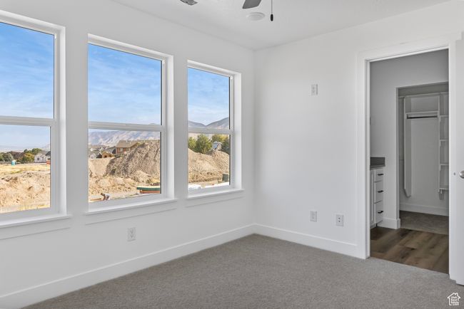 Unfurnished bedroom featuring carpet and baseboards | Image 17