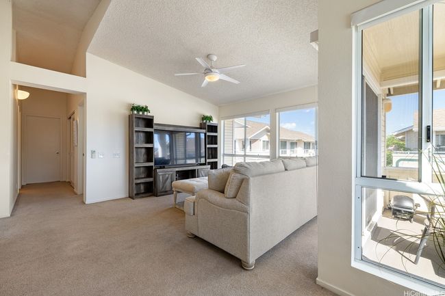 Open concept living - Living/Dining/Kitchen, with walk out to large lanai. | Image 9