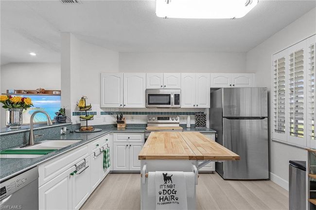 24004 Vincent Ave, House other with 3 bedrooms, 2 bathrooms and 2 parking in PUNTA GORDA FL | Image 12