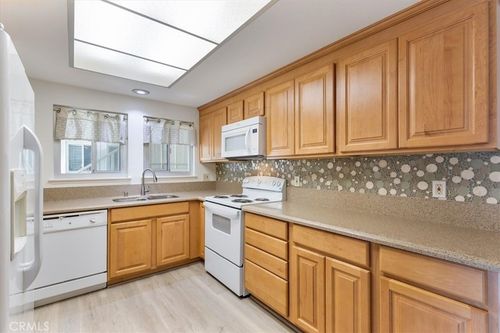 a-2104 Ronda Granada, Laguna Woods, CA, 92637-2492 | Card Image