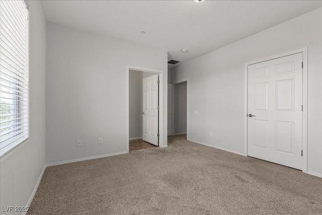 Unfurnished bedroom with carpet flooring and baseboards | Image 24