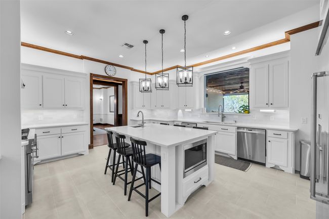 Huge kitchen island with built in seating | Image 13