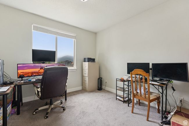 Home office featuring baseboards and carpet flooring | Image 18
