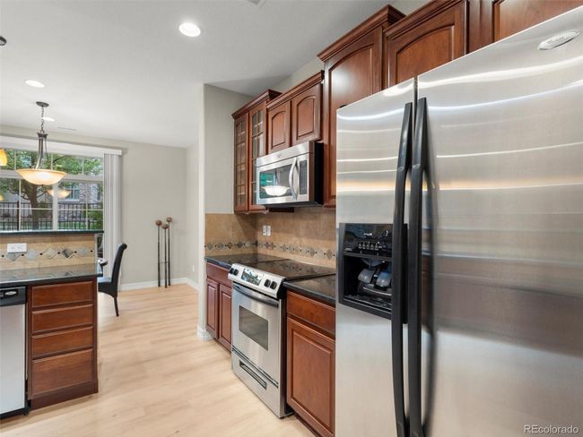 10103 Bluffmont Ln, Townhouse with 2 bedrooms, 3 bathrooms and null parking in Lone Tree CO | Image 10