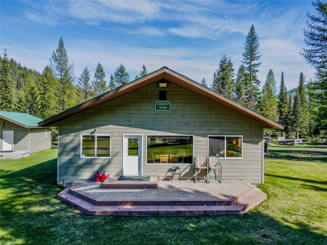 Rear view of property with a yard | Image 82