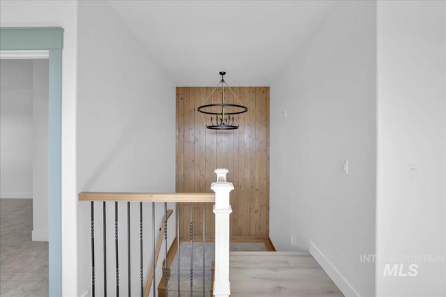Staircase featuring wood walls and baseboards | Image 18