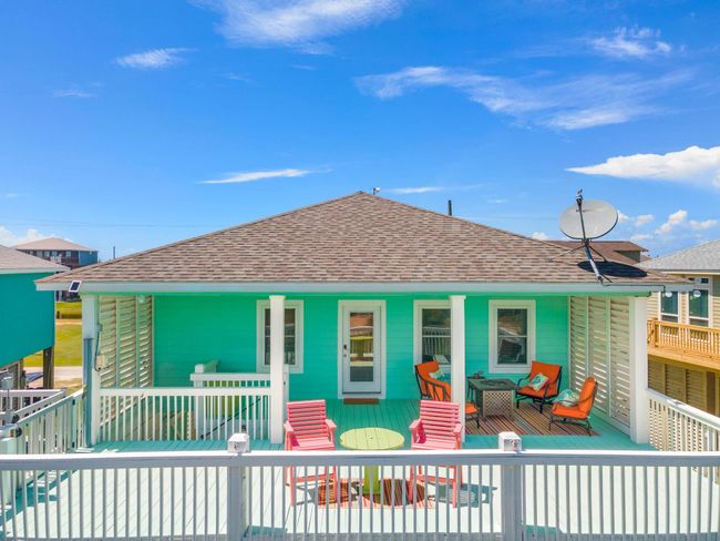 This large deck has a new fire feature table and has a VIEW of the Beach! | Image 6