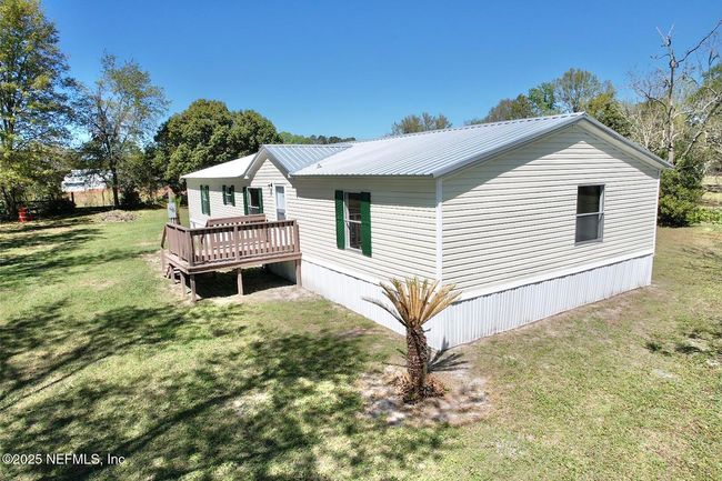 7598 Madison Dr, House other with 4 bedrooms, 2 bathrooms and null parking in Glen St. Mary FL | Image 4
