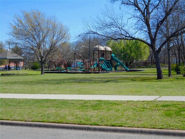 Community playground with a yard | Image 18