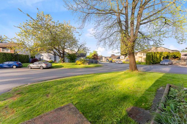 View of green lawn featuring a residential view | Image 23