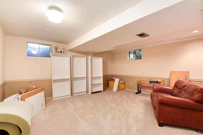 basement living area | Image 25