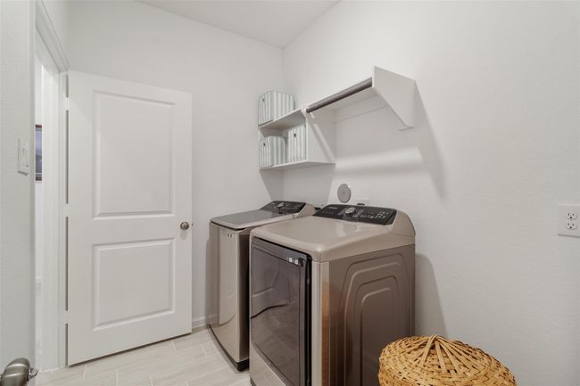 Your primary closet has direct access to the laundry room but also a door you can lock when needed to protect your primary retreat. | Image 31
