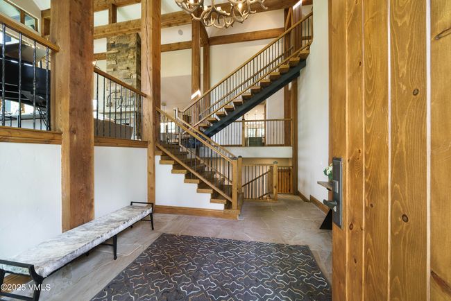 Grand Entry Featuring a New Oak and Metal Floating Staircase. | Image 15
