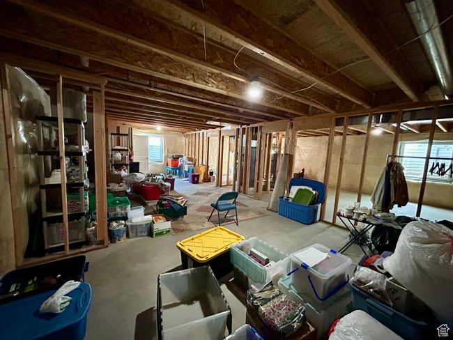 Basement featuring plenty of natural light | Image 27