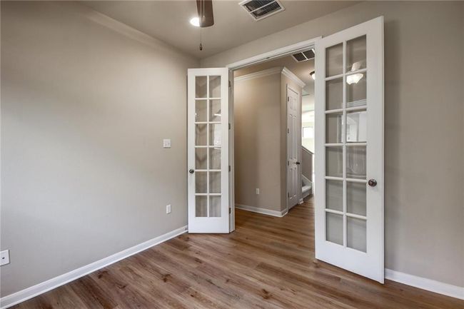Empty room featuring french doors, wood finished floors, and a ceiling​​‌​​​​‌​​‌‌​‌‌​​​‌‌​​‌‌​‌​​​​​‌ fan | Image 22