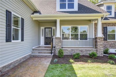 Entrance to property with a porch | Image 3