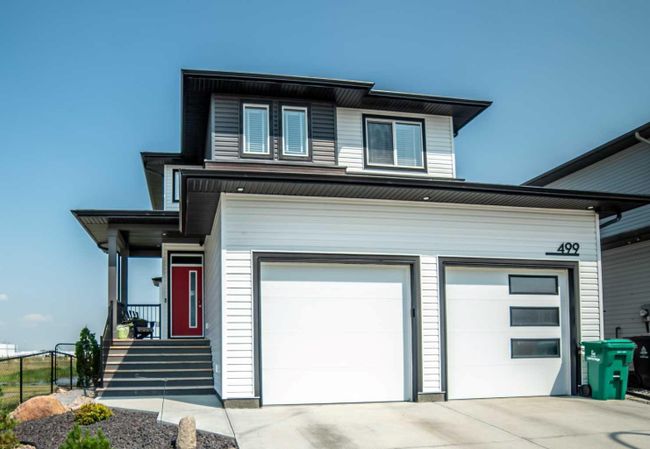 499 Greywolf Cove N, Home with 4 bedrooms, 3 bathrooms and 4 parking in Lethbridge AB | Image 1