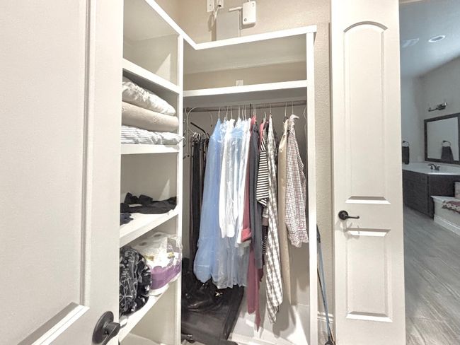Walk-in closet for second bedroom | Image 28